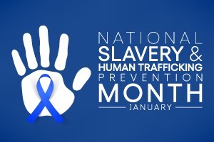 National Slavery and Human Trafficking Prevention Month written out next to a white hand print with a blue ribbon on the palm.