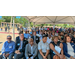 A close up of some of the individuals listening to the speakers at the ceremony.