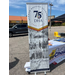 A contractible DHA banner that says Celebrating 75 Years of Service in the City of Durham.