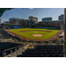 A wide shot of a baseball field and stadium.