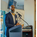 A close up of Chief Executive Officer, Anthony Scott, behind a podium.